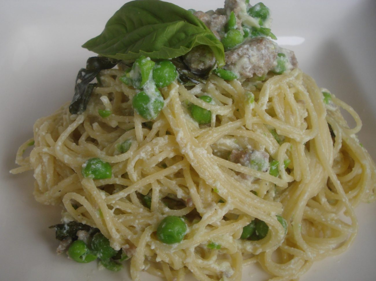 Tagliatelle with Smashed Peas, Sausage and Ricotta Cheese